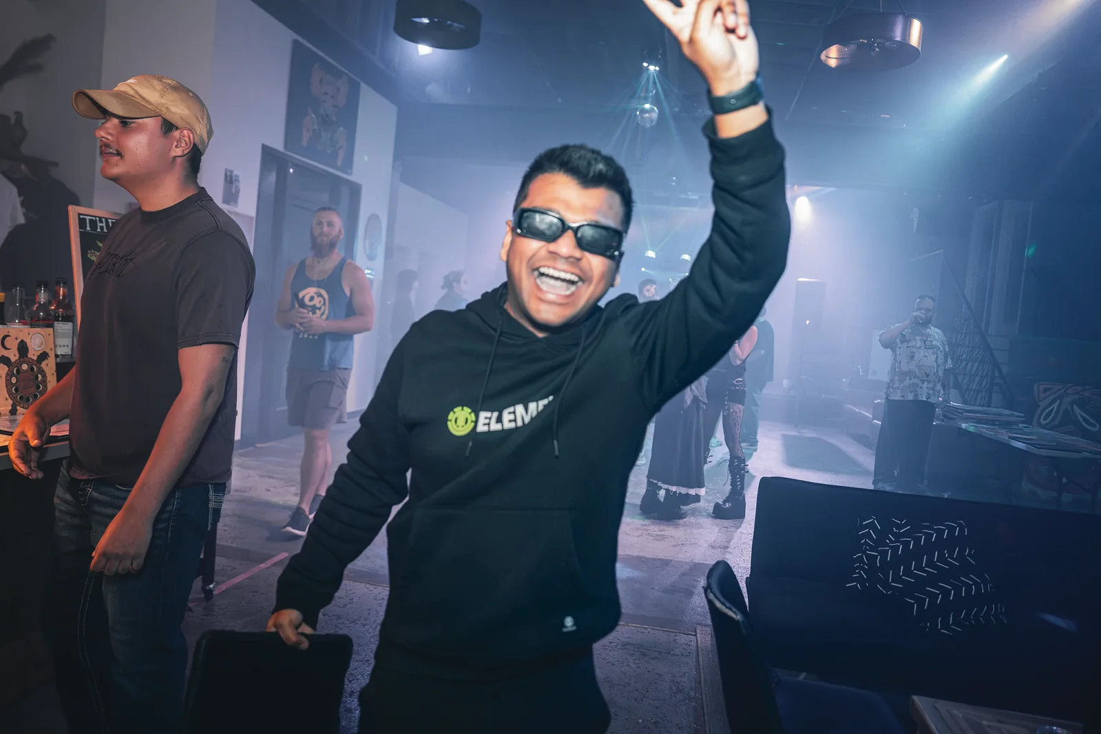 Guest celebrating at the EDM LANC September 25 Local Artist Feature Series
